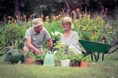 Gardener working safely with protective equipment in Forest Hill