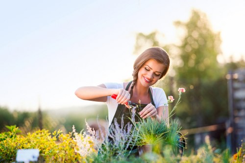 Gardener wearing protective gear while working safely in a garden