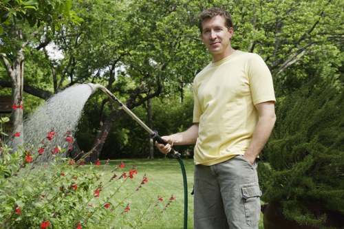 Garden maintenance team trimming hedges in Forest Hill